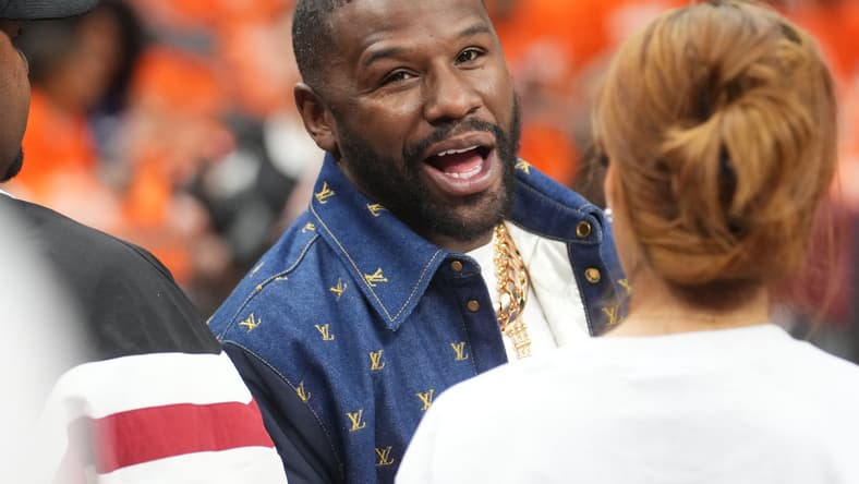 Floyd Mayweather Jr. sits courtside as the Phoenix Mercury play the Las Vegas Aces during Game 3 of the WNBA Finals at Mortgage