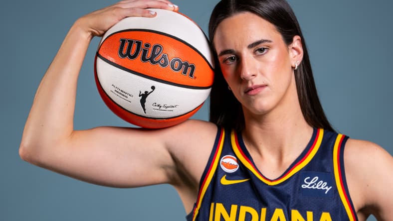 Indiana Fever guard Caitlin Clark (22) poses for a photo Wednesday, April 22, 2026, during media day at Gainbridge Fieldhouse in