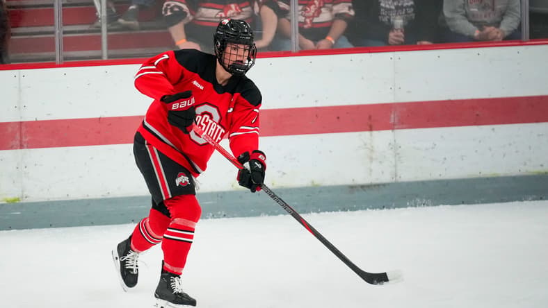 Ohio State Buckeyes defenseman Emma Peschel (7) passes the puck in the first period during the first round of the WCHA at OSU