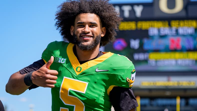 Oregon quarterback Dante Moore walks off the field during the Oregon Ducks annual spring game on April 25, 2026 at Autzen