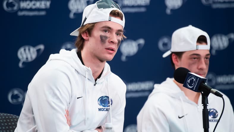 Penn State's Gavin McKenna, left, answers a question during a post-game press conference following a Big Ten hockey game against