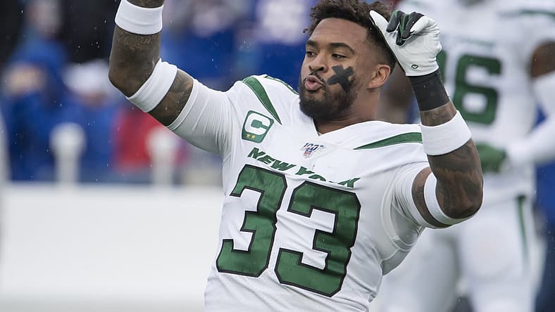 Jamal Adams warms up before game