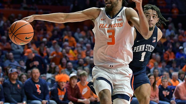 Mar 3, 2022; Champaign, Illinois, USA;  Illinois Fighting Illini guard/forward Jacob Grandison (3) loses control of the ball in front of Penn State Nittany Lions forward Seth Lundy (1) during the first half at State Farm Center. Mandatory Credit: Ron Johnson-USA TODAY Sports