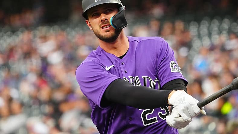 Apr 19, 2022; Denver, Colorado, USA; Colorado Rockies left fielder Kris Bryant (23) on deck in the first inning against the Philadelphia Phillies at Coors Field. Mandatory Credit: Ron Chenoy-USA TODAY Sports