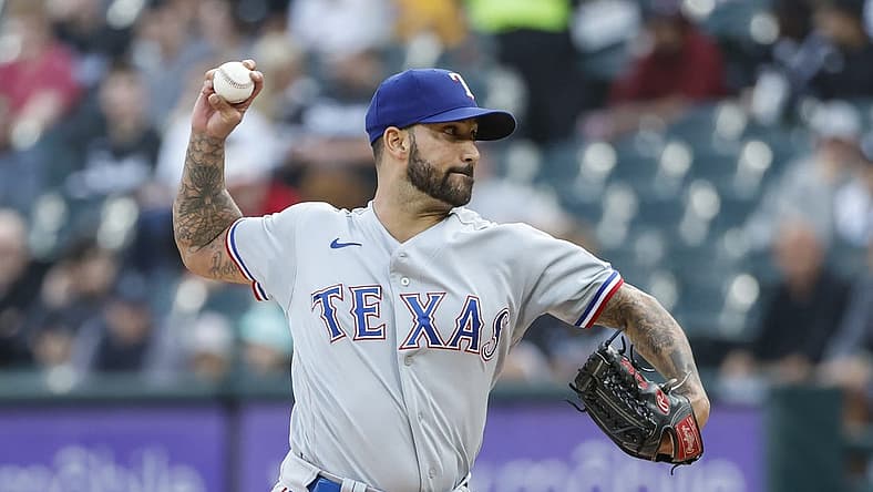 Jun 10, 2022; Chicago, Illinois, USA; Texas Rangers starting pitcher Matt Bush (51) delivers against the Chicago White Sox during the first inning at Guaranteed Rate Field. Mandatory Credit: Kamil Krzaczynski-USA TODAY Sports