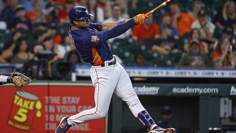 Jun 12, 2022; Houston, Texas, USA; Houston Astros shortstop Jeremy Pena (3) hits a home run during the fourth inning against the Miami Marlins at Minute Maid Park. Mandatory Credit: Troy Taormina-USA TODAY Sports