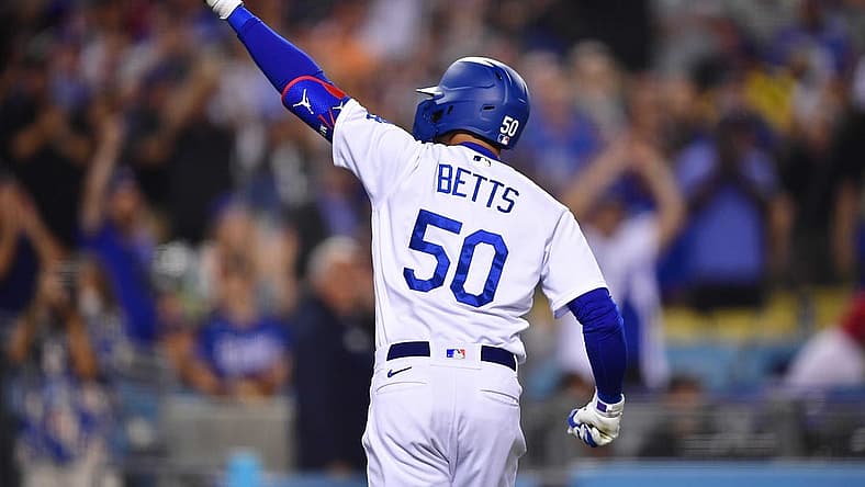 Jun 14, 2022; Los Angeles, California, USA; Los Angeles Dodgers right fielder Mookie Betts (50) celebrates his solo home run hit against the Los Angeles Angels during the eighth inning at Dodger Stadium. Mandatory Credit: Gary A. Vasquez-USA TODAY Sports