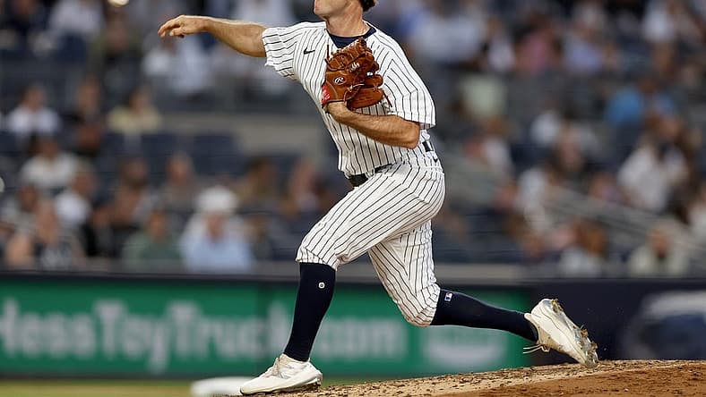 Jun 16, 2022; Bronx, New York, USA; New York Yankees relief pitcher Ryan Weber (85) delivers a pitch during the fourth inning against the Tampa Bay Rays at Yankee Stadium. Mandatory Credit: Vincent Carchietta-USA TODAY Sports
