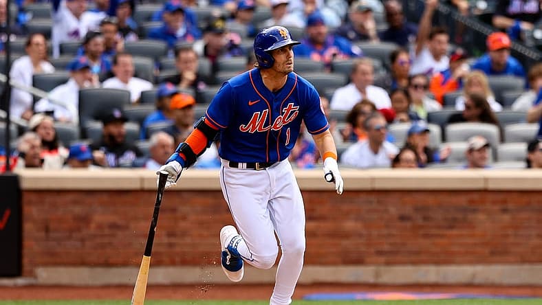 Jun 18, 2022; New York City, New York, USA; New York Mets second baseman Jeff McNeil (1) drops the bat after hitting an RBI single against the Miami Marlins during the second inning at Citi Field. Mandatory Credit: Jessica Alcheh-USA TODAY Sports