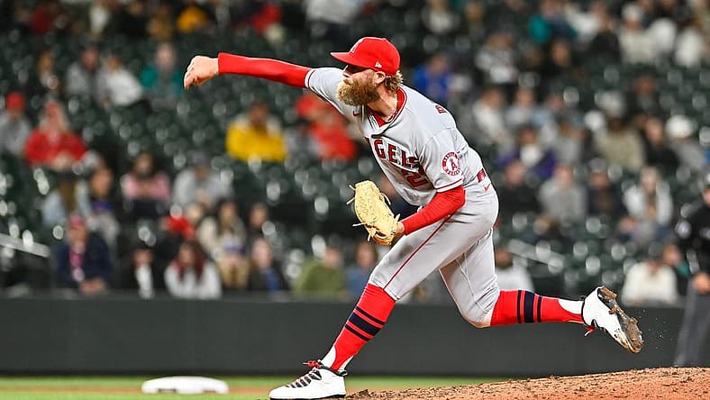 Jun 18, 2022; Seattle, Washington, USA; Los Angeles Angels relief pitcher Archie Bradley (23) throws against the Seattle Mariners during the ninth inning at T-Mobile Park. Los Angeles won 3-0. Mandatory Credit: Steven Bisig-USA TODAY Sports