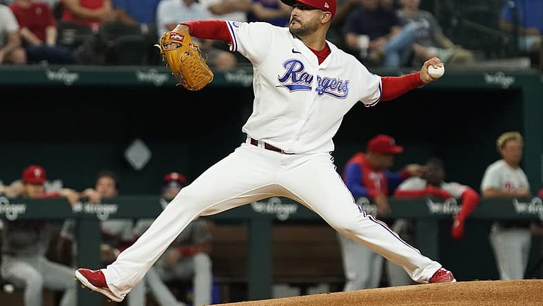 Jun 21, 2022; Arlington, Texas, USA; Texas Rangers starting pitcher Martin Perez (54) throws to the plate during the first inning against the Philadelphia Phillies at Globe Life Field. Mandatory Credit: Raymond Carlin III-USA TODAY Sports