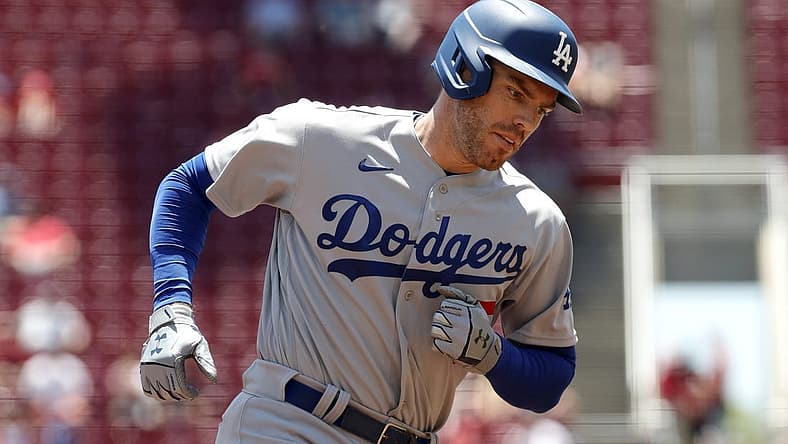 Jun 23, 2022; Cincinnati, Ohio, USA; Los Angeles Dodgers first baseman Freddie Freeman (5) runs the bases after hitting a two-run home run against the Cincinnati Reds during the third inning at Great American Ball Park. Mandatory Credit: David Kohl-USA TODAY Sports