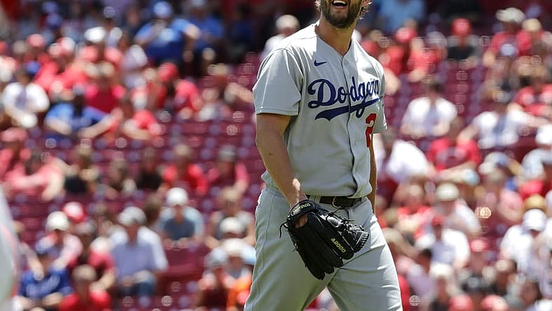 Jun 23, 2022; Cincinnati, Ohio, USA; Los Angeles Dodgers starting pitcher Clayton Kershaw (22) walks off the field during the sixth inning against the Cincinnati Reds at Great American Ball Park. Mandatory Credit: David Kohl-USA TODAY Sports