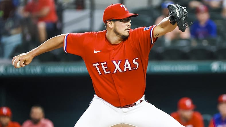 Jun 24, 2022; Arlington, Texas, USA; Texas Rangers starting pitcher Dane Dunning (33) throws during the first inning against the Washington Nationals at Globe Life Field. Mandatory Credit: Kevin Jairaj-USA TODAY Sports