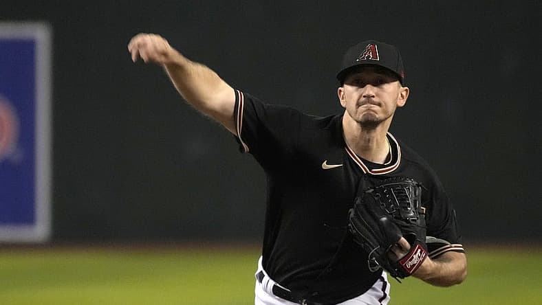 Jun 25, 2022; Phoenix, Arizona, USA; Arizona Diamondbacks starting pitcher Zach Davies (27) throws against the Detroit Tigers in the first inning at Chase Field. Mandatory Credit: Rick Scuteri-USA TODAY Sports