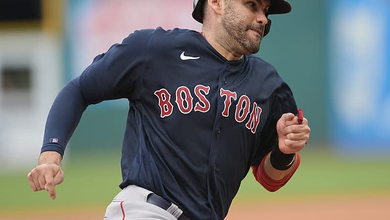 Jun 26, 2022; Cleveland, Ohio, USA; Boston Red Sox designated hitter J.D. Martinez (28) advances to third on a single by left fielder Alex Verdugo (not pictured) during the sixth inning against the Cleveland Guardians at Progressive Field. Mandatory Credit: Ken Blaze-USA TODAY Sports
