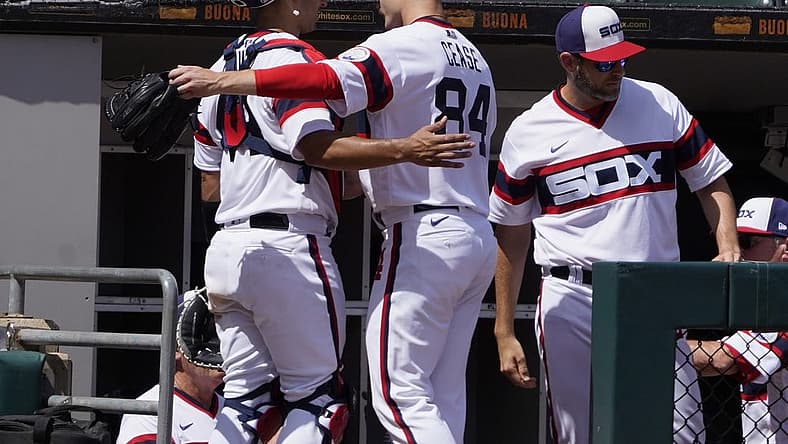 Jun 26, 2022; Chicago, Illinois, USA; Chicago White Sox starting pitcher Dylan Cease (84) is greeted by catcher Seby Zavala (44) after the end of the seventh inning at Guaranteed Rate Field. Mandatory Credit: David Banks-USA TODAY Sports