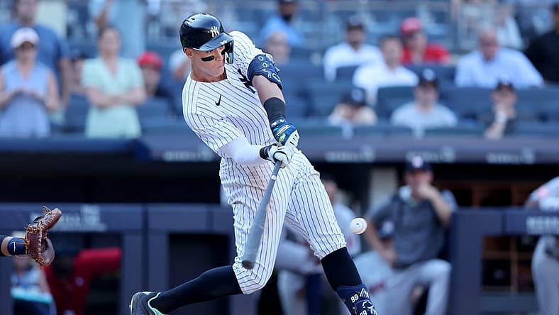 Jun 26, 2022; Bronx, New York, USA; New York Yankees center fielder Aaron Judge (99) hits a game winning walk off three run home run against the Houston Astros during the tenth inning at Yankee Stadium. Mandatory Credit: Brad Penner-USA TODAY Sports