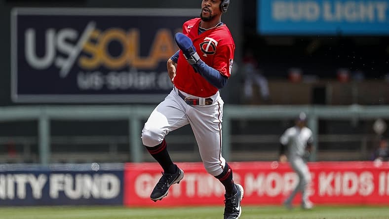 Jun 26, 2022; Minneapolis, Minnesota, USA; Minnesota Twins designated hitter Byron Buxton (25) runs to third from first on a single by Carlos Correa (not pictured) against the Colorado Rockies in the first inning at Target Field. Mandatory Credit: Bruce Kluckhohn-USA TODAY Sports