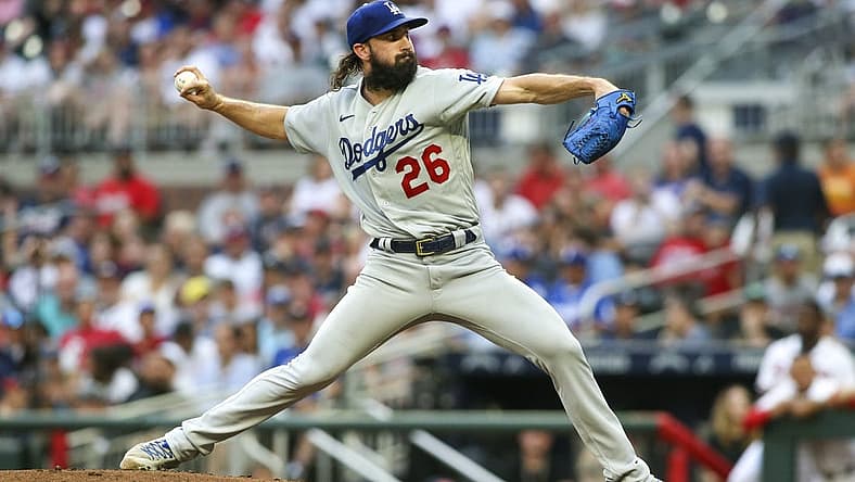 Jun 26, 2022; Atlanta, Georgia, USA; Los Angeles Dodgers starting pitcher Tony Gonsolin (26) throws against the Atlanta Braves in the first inning at Truist Park. Mandatory Credit: Brett Davis-USA TODAY Sports