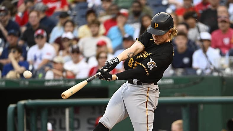 Jun 27, 2022; Washington, District of Columbia, USA; Pittsburgh Pirates left fielder Jack Suwinski (65) hits a double against the Washington Nationals during the second inning at Nationals Park. Mandatory Credit: Brad Mills-USA TODAY Sports