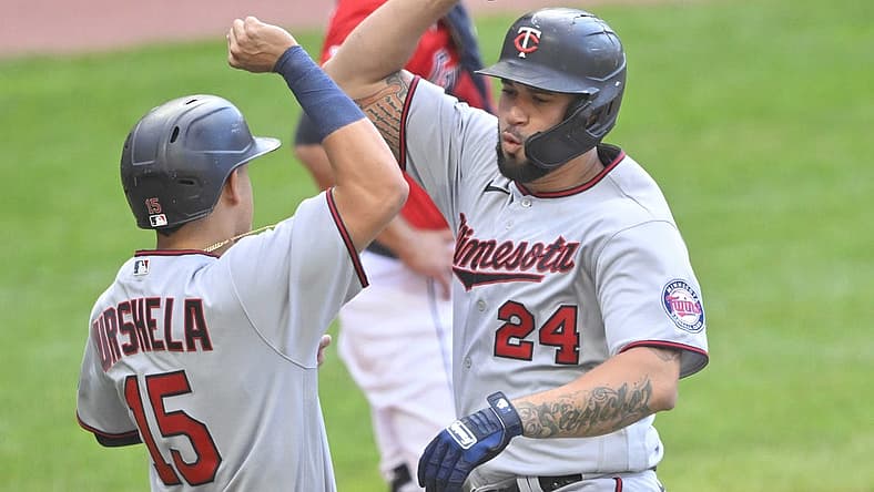 Jun 27, 2022; Cleveland, Ohio, USA; Minnesota Twins designated hitter Gary Sanchez (24) celebrates his three run home run with third baseman Gio Urshela (15) in the second inning against the Cleveland Guardians at Progressive Field. Mandatory Credit: David Richard-USA TODAY Sports