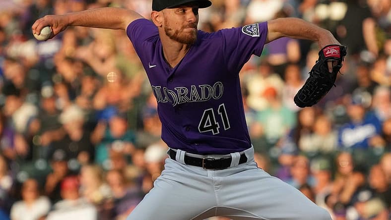 Jun 27, 2022; Denver, Colorado, USA; Colorado Rockies starting pitcher Chad Kuhl (41) delivers a pitch in the fourth inning against the Los Angeles Dodgers at Coors Field. Mandatory Credit: Ron Chenoy-USA TODAY Sports