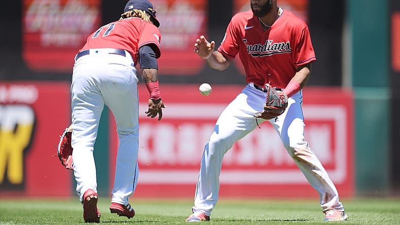 Jun 28, 2022; Cleveland, Ohio, USA;
Cleveland Guardians third baseman Jose Ramirez (11) and shortstop Amed Rosario (1) can not make the catch of a single hit by Minnesota Twins second baseman Luis Arraez (not pictured) during the third inning at Progressive Field. Mandatory Credit: Ken Blaze-USA TODAY Sports