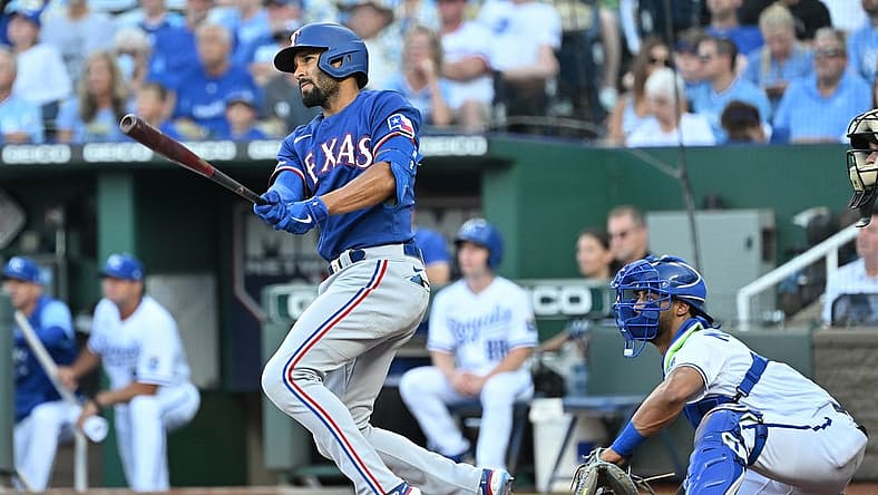 Jun 28, 2022; Kansas City, Missouri, USA;  Texas Rangers second baseman Marcus Semien (2) singles during the first inning against the Kansas City Royals at Kauffman Stadium. Mandatory Credit: Peter Aiken-USA TODAY Sports