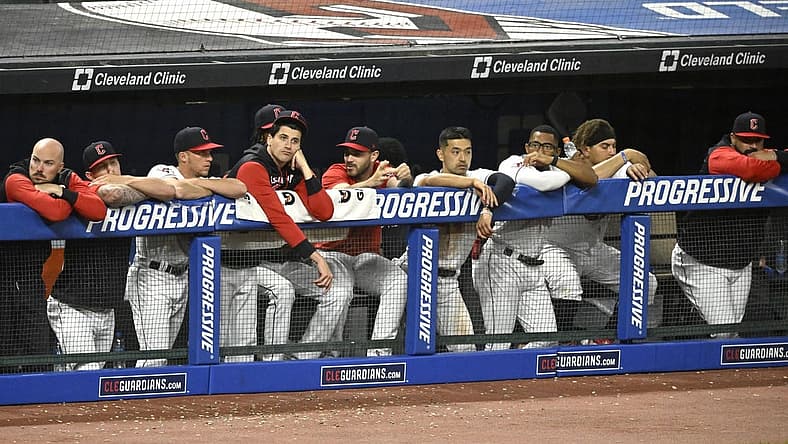 Jun 28, 2022; Cleveland, Ohio, USA; The Cleveland Guardians stand in the dugout in the ninth inning of a loss to the Minnesota Twins at Progressive Field. Mandatory Credit: David Richard-USA TODAY Sports