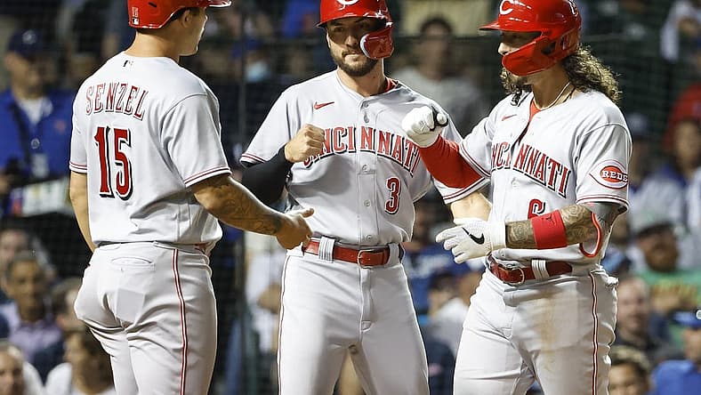 Jun 28, 2022; Chicago, Illinois, USA; Cincinnati Reds second baseman Jonathan India (6) celebrates with right fielder Albert Almora Jr. (3) and center fielder Nick Senzel (15) after hitting a three-run home run against the Chicago Cubs during the seventh inning at Wrigley Field. Mandatory Credit: Kamil Krzaczynski-USA TODAY Sports