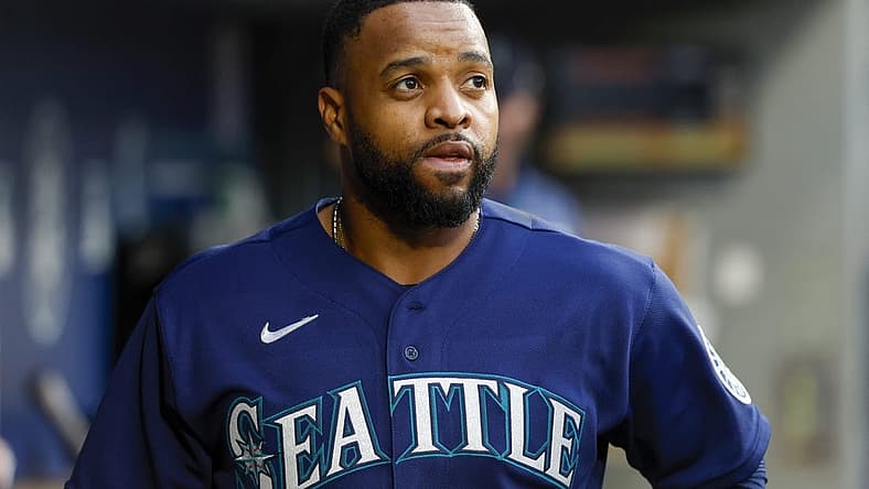 Jun 28, 2022; Seattle, Washington, USA; Seattle Mariners first baseman Carlos Santana (41) stands in the dugout during the third inning against the Baltimore Orioles at T-Mobile Park. Mandatory Credit: Joe Nicholson-USA TODAY Sports