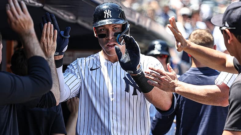 Jun 29, 2022; Bronx, New York, USA; New York Yankees center fielder Aaron Judge (99) celebrates his two-run home run during the first inning against the Oakland Athletics at Yankee Stadium. Mandatory Credit: Vincent Carchietta-USA TODAY Sports