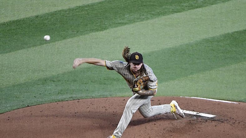 Jun 29, 2022; Phoenix, Arizona, USA;  San Diego Padres starting pitcher Mike Clevinger (52) throws in the first inning against the Arizona Diamondbacks at Chase Field. Mandatory Credit: Matt Kartozian-USA TODAY Sports