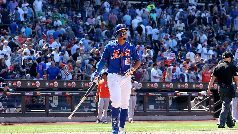 Jun 29, 2022; New York City, New York, USA; New York Mets shortstop Francisco Lindor (12) reacts as he walks off the field after striking out to end the game against the Houston Astros at Citi Field. Mandatory Credit: Brad Penner-USA TODAY Sports