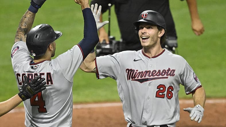 Jun 29, 2022; Cleveland, Ohio, USA; Minnesota Twins right fielder Max Kepler (26) celebrates his two-run home run with shortstop Carlos Correa (4) in the tenth inning against the Cleveland Guardians at Progressive Field. Mandatory Credit: David Richard-USA TODAY Sports