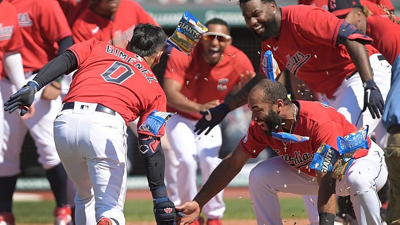 Jun 30, 2022; Cleveland, Ohio, USA; Cleveland Guardians shortstop Amed Rosario (1) celebrates with second baseman Andres Gimenez (0) after Gimenez hit a game winning two run home run during the ninth inning against the Minnesota Twins at Progressive Field. Mandatory Credit: Ken Blaze-USA TODAY Sports