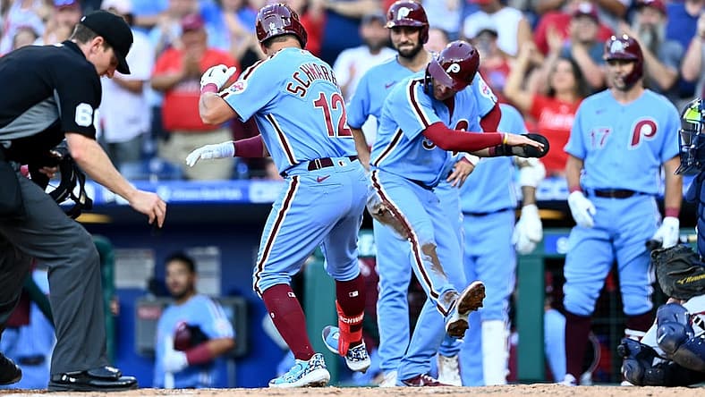 Jun 30, 2022; Philadelphia, Pennsylvania, USA; Philadelphia Phillies outfielder Kyle Schwarber (12) celebrates with infielder Bryson Stott (5) after hitting a three-run home run against the Atlanta Braves in the third inning at Citizens Bank Park. Mandatory Credit: Kyle Ross-USA TODAY Sports