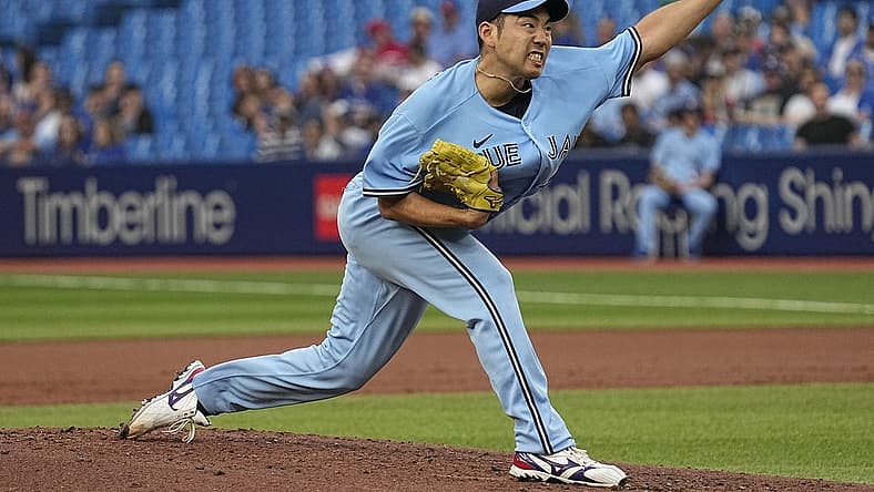 Jun 30, 2022; Toronto, Ontario, CAN; Toronto Blue Jays starting pitcher Yusei Kikuchi (16) throws a pitch to the Tampa Bay Rays during the second inning at Rogers Centre. Mandatory Credit: John E. Sokolowski-USA TODAY Sports