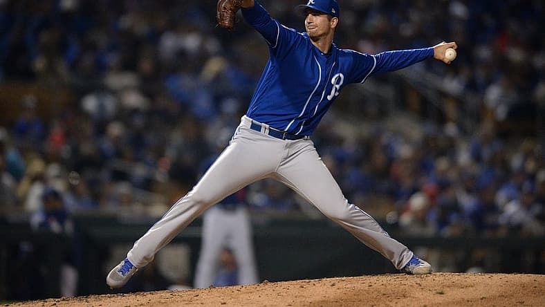 Mar 8, 2019; Phoenix, AZ, USA; Kansas City Royals relief pitcher Foster Griffin (60) works against a Los Angeles Dodgers batter during the fifth inning at Camelback Ranch. Mandatory Credit: Orlando Ramirez-USA TODAY Sports