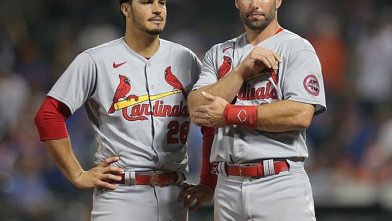 Sep 14, 2021; New York City, New York, USA; St. Louis Cardinals third baseman Nolan Arenado (28) talks to first baseman Paul Goldschmidt (46) after being stranded on the bases against the New York Mets in the top of the tenth inning at Citi Field. Mandatory Credit: Brad Penner-USA TODAY Sports