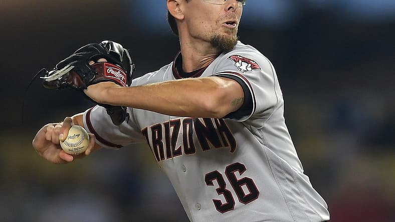 Sep 14, 2021; Los Angeles, California, USA; Arizona Diamondbacks relief pitcher Tyler Clippard (36) throws a scoreless eighth inning against the Los Angeles Dodgers at Dodger Stadium. Mandatory Credit: Jayne Kamin-Oncea-USA TODAY Sports