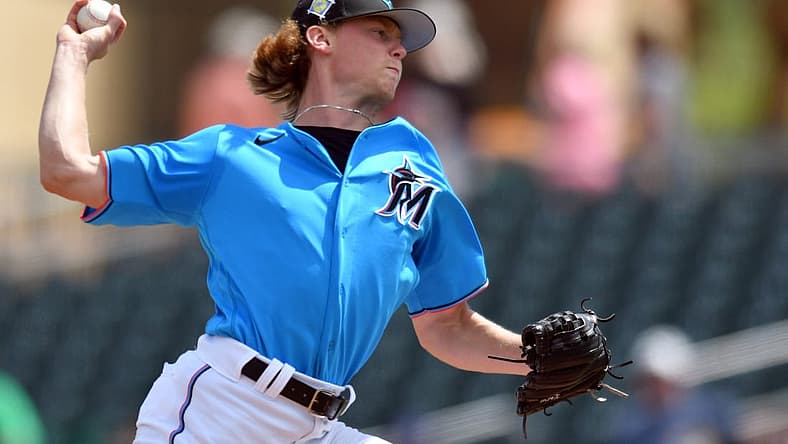 Mar 21, 2022; Jupiter, Florida, USA; Miami Marlins pitcher Max Meyer (63) pitches against the New York Mets in the fourth inning during a spring training game at Roger Dean Stadium. Mandatory Credit: Jim Rassol-USA TODAY Sports