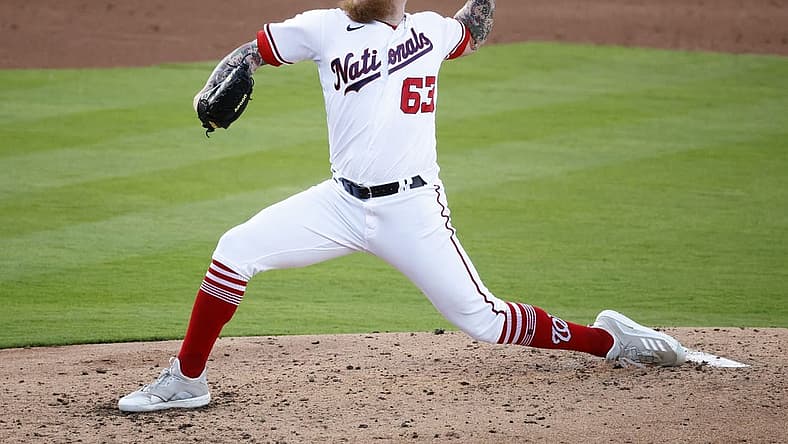Mar 21, 2022; West Palm Beach, Florida, USA; Washington Nationals pitcher Sean Doolittle (63) pitches against the St. Louis Cardinals in the third inning during spring training at The Ballpark of the Palm Beaches. Mandatory Credit: Rhona Wise-USA TODAY Sports