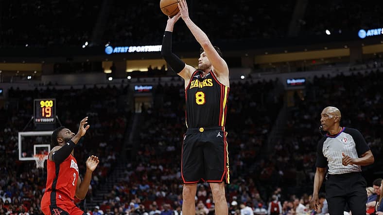Apr 10, 2022; Houston, Texas, USA; Atlanta Hawks forward Danilo Gallinari (8) shoots the ball as Houston Rockets forward David Nwaba (2) defends during the fourth quarter at Toyota Center. Mandatory Credit: Troy Taormina-USA TODAY Sports