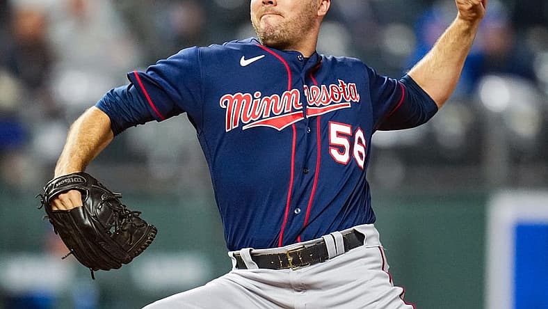 Apr 20, 2022; Kansas City, Missouri, USA; Minnesota Twins relief pitcher Caleb Thielbar (56) pitches against the Kansas City Royals during the sixth inning at Kauffman Stadium. Mandatory Credit: Jay Biggerstaff-USA TODAY Sports