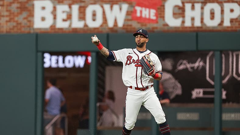Apr 22, 2022; Cumberland, Georgia, USA; Atlanta Braves left fielder Eddie Rosario (8) catches a ball to force out Miami Marlins shortstop Miguel Rojas (not pictured) during the ninth inning at Truist Park. Mandatory Credit: Mackenzie Lynn Miles-USA TODAY Sports