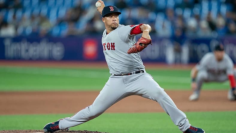 Apr 28, 2022; Toronto, Ontario, CAN; Boston Red Sox relief pitcher Hansel Robles (57) throws a pitch during the eighth inning against the Toronto Blue Jays at Rogers Centre. Mandatory Credit: Nick Turchiaro-USA TODAY Sports
