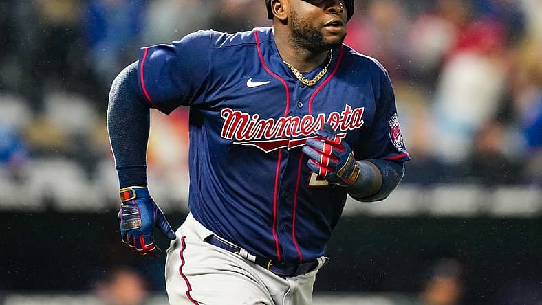 Apr 20, 2022; Kansas City, Missouri, USA; Minnesota Twins first baseman Miguel Sano (22) runs to first base during the fifth inning against the Kansas City Royals at Kauffman Stadium. Mandatory Credit: Jay Biggerstaff-USA TODAY Sports