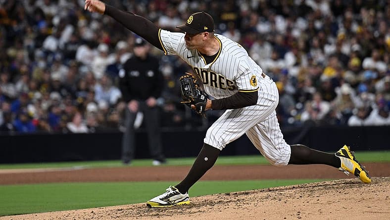 May 9, 2022; San Diego, California, USA; San Diego Padres relief pitcher Craig Stammen (34) throws a pitch against the Chicago Cubs during the sixth inning at Petco Park. Mandatory Credit: Orlando Ramirez-USA TODAY Sports